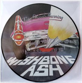 [Picture Disc, side A]